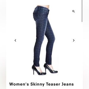 Cult of Individuality teaser jeans with upraised black velvet design